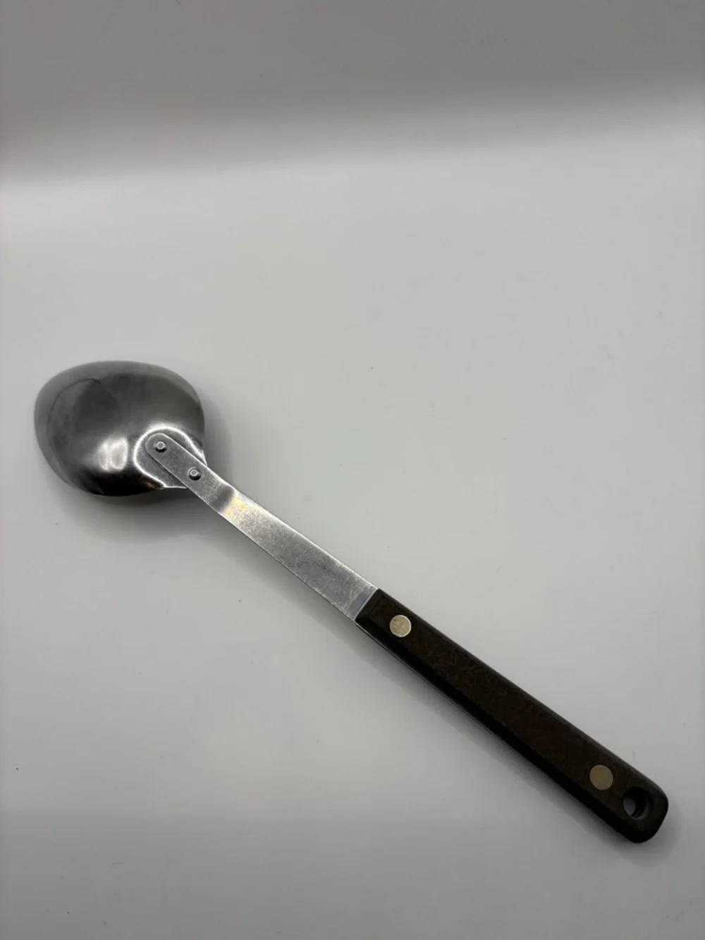 Ekco Flint Vanadium Stainless Serving Ladle with Dark Brown Handle